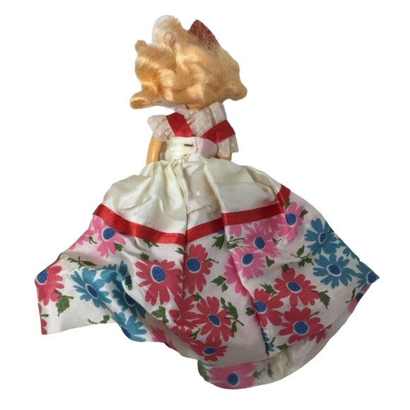 Vintage Collectible Doll With Blonde Hair wearing floral printed dress/red bow - Picture 2 of 8